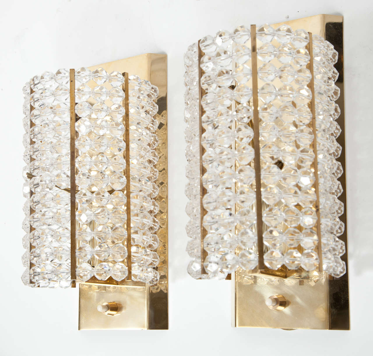 A striking pair of sconces made up of Lucite beads on a brass frame. Perfect for a small space or powder room. Newly rewired.