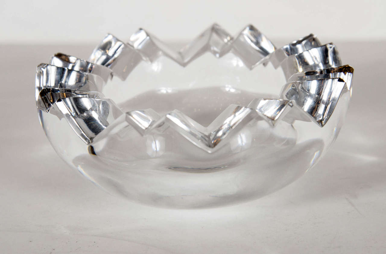 This ultra chic bowl features a jagged edge design detail along the rim of this piece. It is also signed Rosenthal Studio Line on the bottom as well.