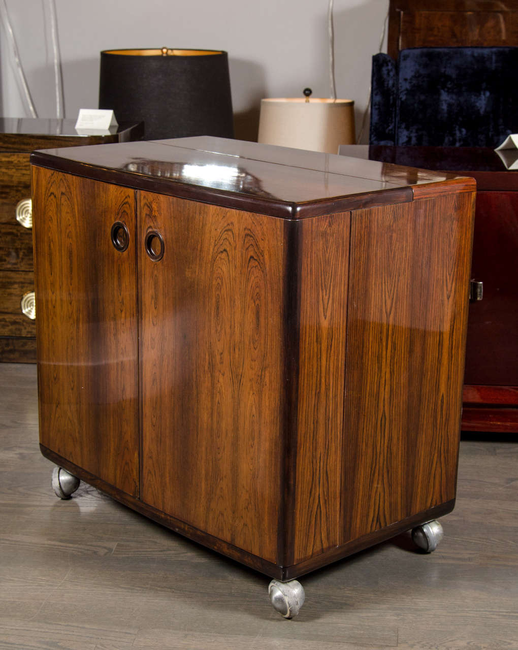 Mid Century Modernist Bookmatched Rosewood Flip Top Bar Cabinet At This Outstanding Mid Century Modernist Flip Top Bar Cabinet Features A Pair Of Center