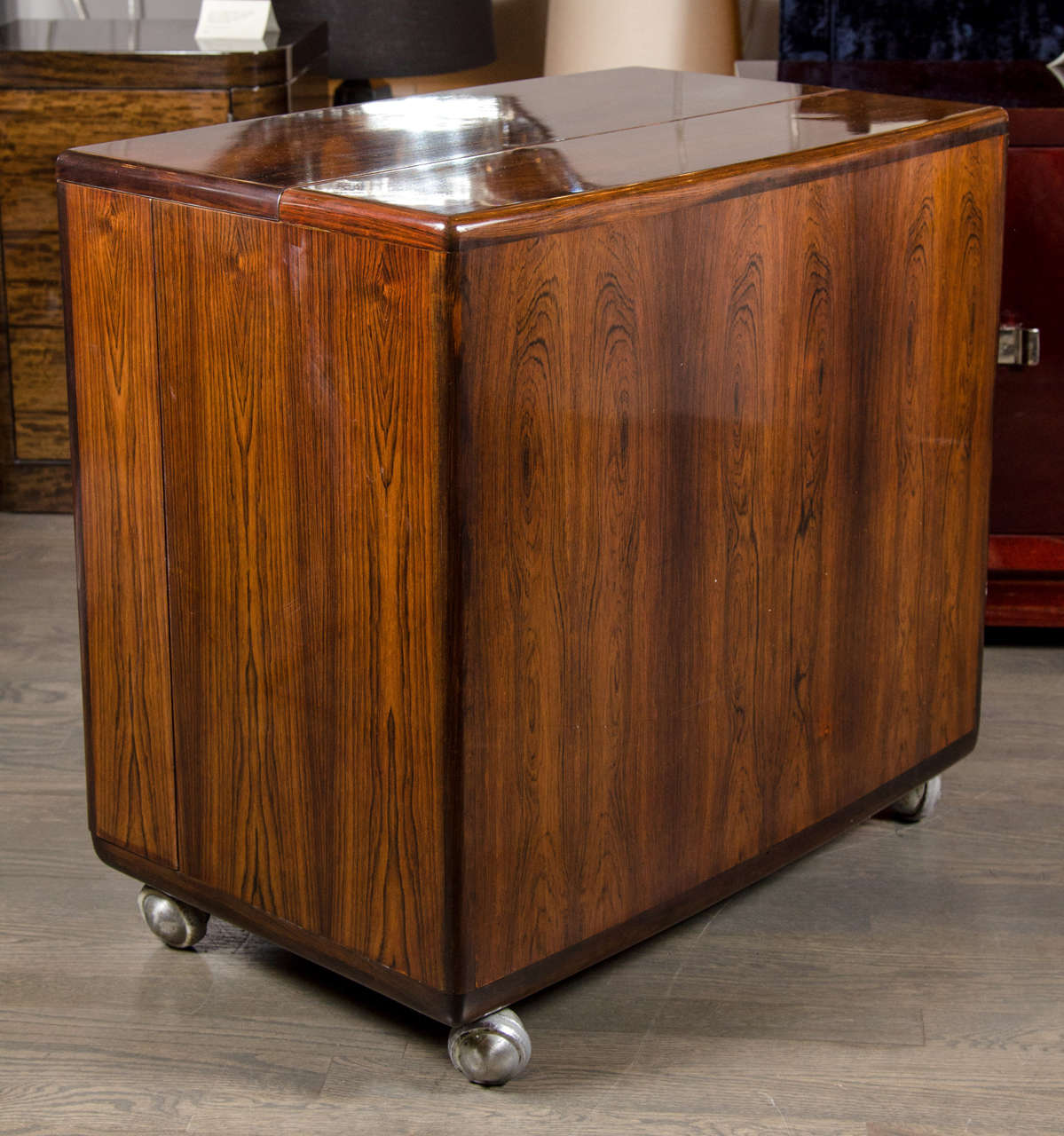 Mid-Century Modernist Bookmatched Rosewood Flip-Top Bar Cabinet 1