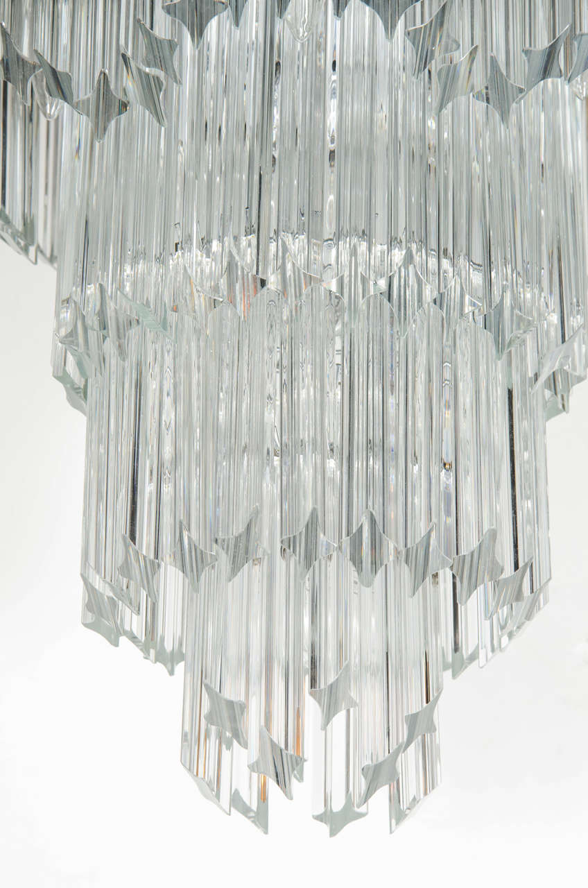 Italian Mid-Century Modernist Scalloped Four-Tier Cut Triedre Crystal Camer Chandelier