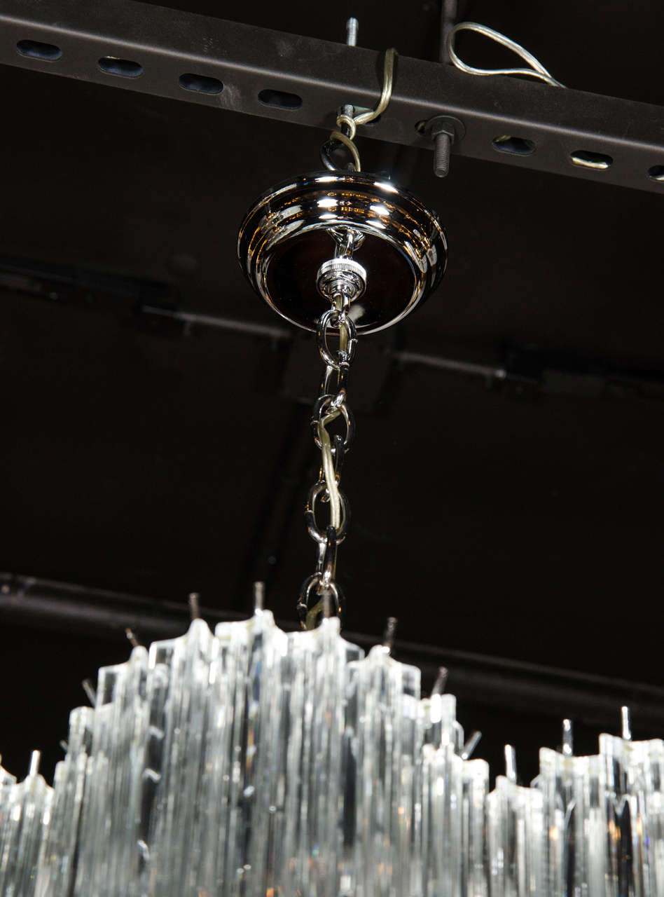 Late 20th Century Mid-Century Modernist Scalloped Four-Tier Cut Triedre Crystal Camer Chandelier