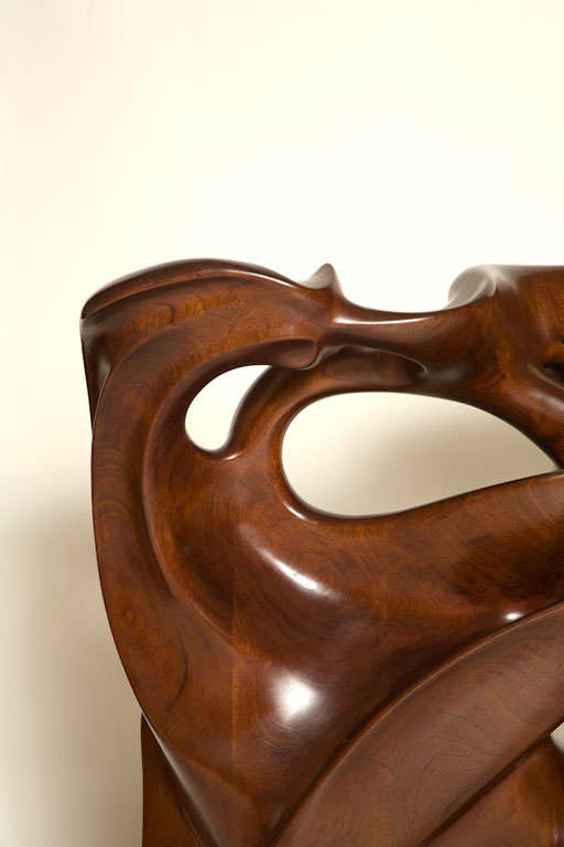 Striking large scale Sculpture of a stylized horse and rider.  Carved from beautiful Mahogany sculpture is carved with conjoined initials and the date 78.