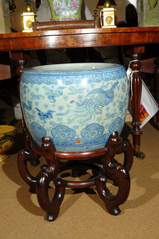 a Chinese fish bowl with stand <br />
<br />
the height of the bowl and stand together is 24