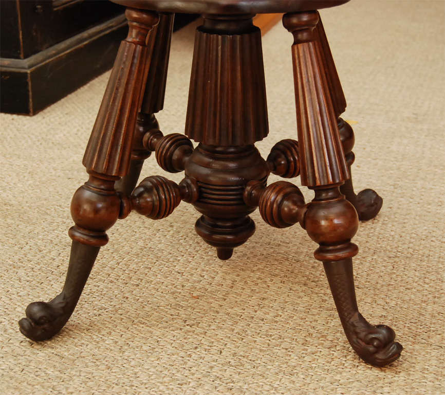 Unknown A Walnut Stained Piano Stool