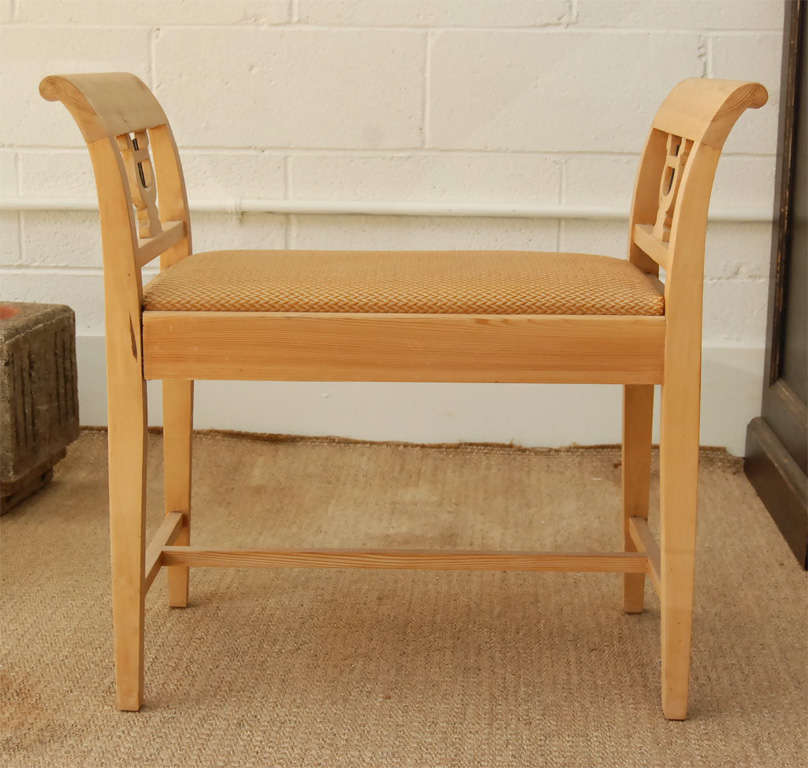 Here is a sweet Swedish cerused oak bench with curved arms and <br />
a harp motif. Simple and stylish. Original horse hair upholstery.