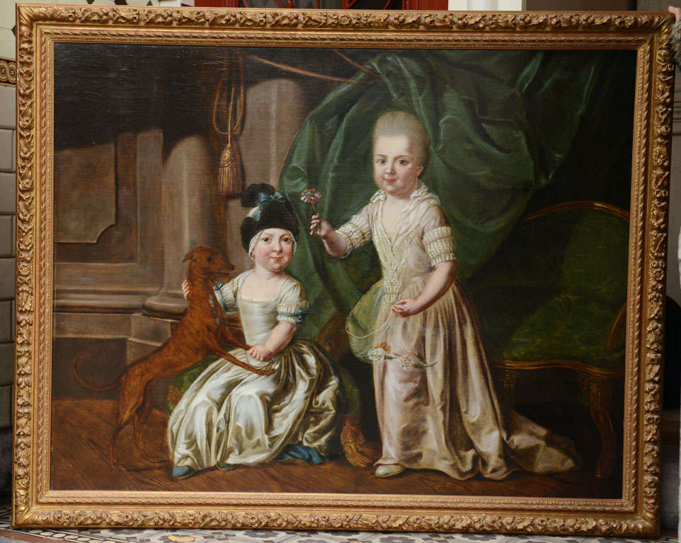 Girl and a boy, playing with a dog, situated in an interior.
Signed Barend Gaal.
Contemporary frame.