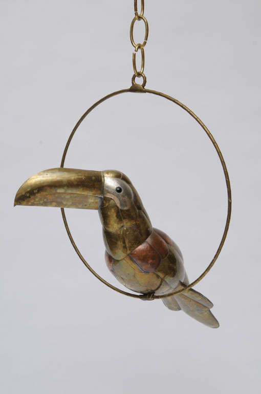 A delightfully diminutive mixed metal toucan by Sergio Bustamante. (We've left him in his original state, but can polish him up if you'd like.) Signed.