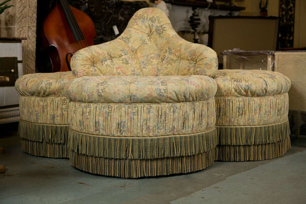 Round Sofa - Borne Settee.  Known as conversation seat.  Arose during Napoleon III period in France (mid 1800's).  Depending on style, three or four people could have a 