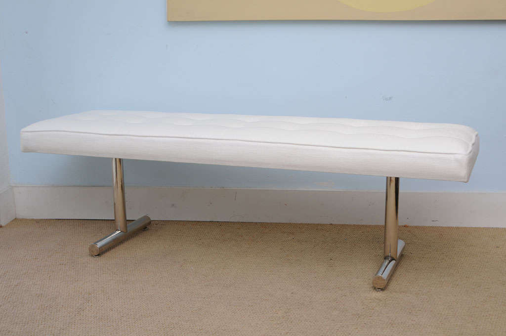 This piece has been Totally re-furnished , legs have been re- nickeled , seat has been re-foamed and reupholstered In a white crisp linen blend fabric . Great for foot of the bed, Entry way or hallway 