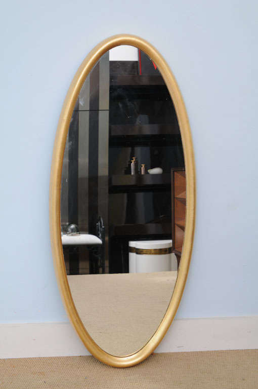 Beautifully restored 1950,s oval chic mirror . It has  been gold  leafed and is ready to be hung  and add chic ness to any fabulous interior.