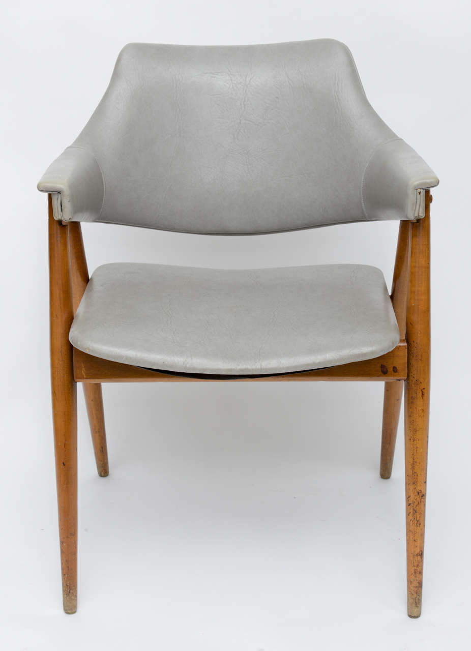 Beautiful MCM vinyl and wood chair from the 50s attributed to Paul McCobb.