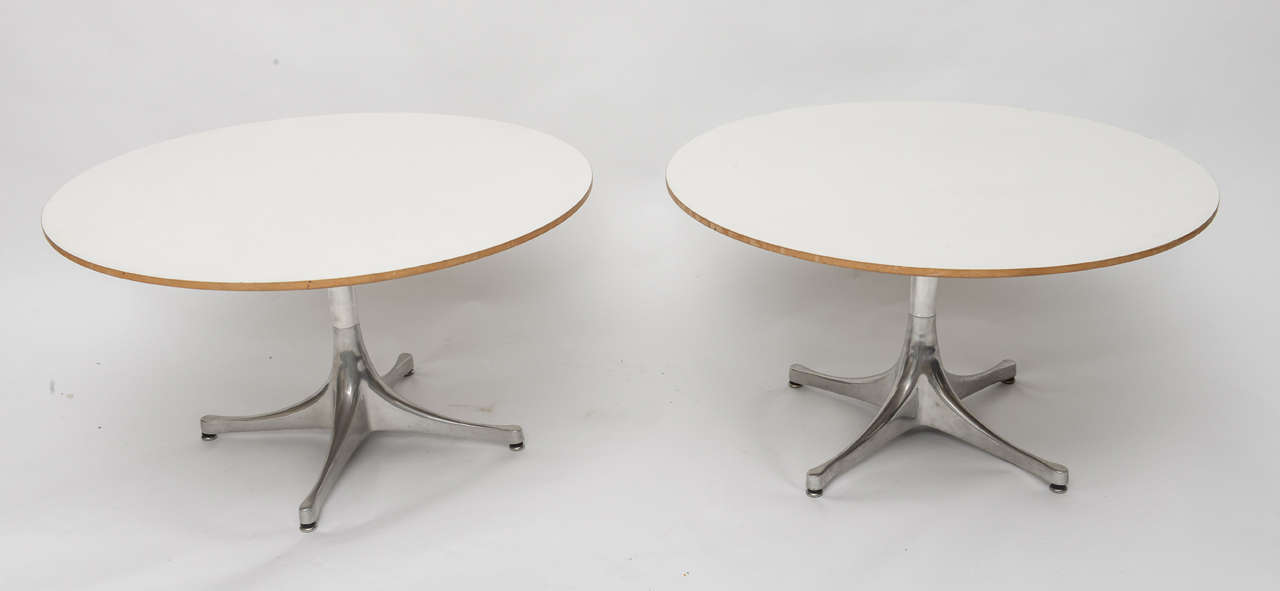 Pair of beautiful white and aluminum swag leg end tables created by George Nelson for Herman Miller.