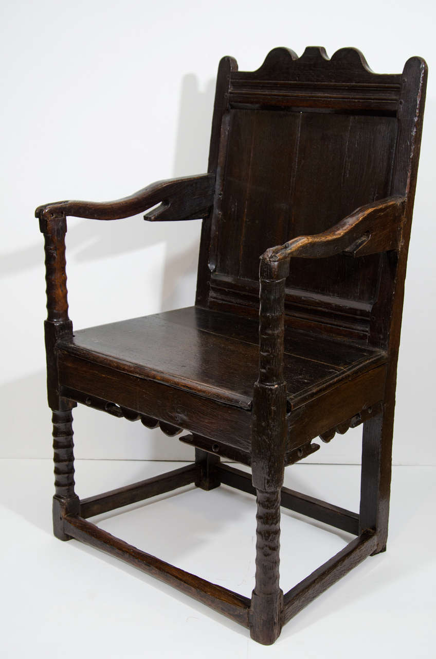 A Charles II Oak Wainscot Armchair