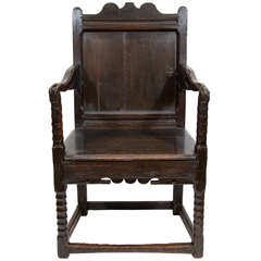 A Charles II Oak Wainscot Armchair