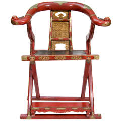 A Japanese Red Lacquer and Gilt Folding Chair