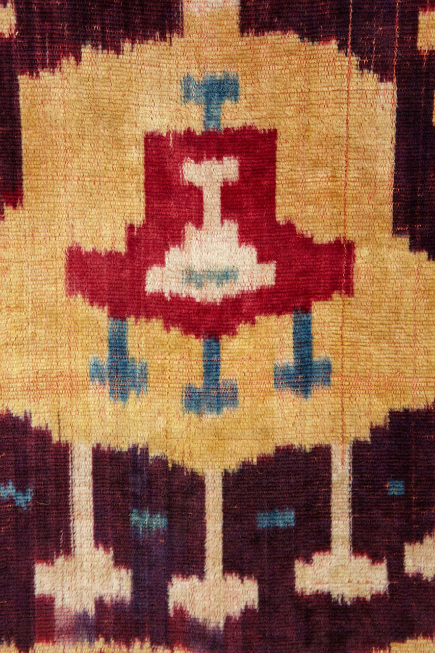 Among the weavings of Central Asia, Ikat textiles best express the quality and purity of color as well as the magic of abstract forms. The rare examples woven in silk velvet were very expensive and difficult to manufacture, and were destined to high
