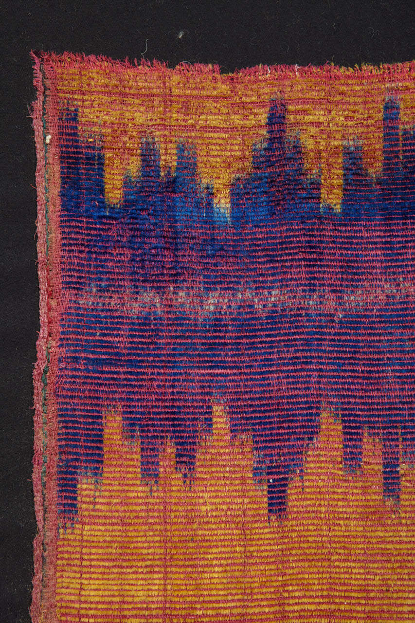 Among the weavings of Central Asia, Ikat textiles best express the quality and purity of colour as well as the magic of abstract forms. The rare examples woven in silk velvet were very expensive and difficult to manufacture and were destined to high