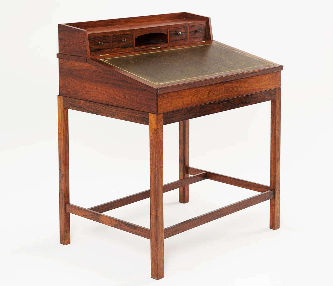 Secretaire, rosewood with olive green leather inlay, Denmark, 1940s

Can be used as a luxurious writing desk due to the tight but elegant designed shapes and combination of materials. Nice brass pulls on the small drawers.

Free shipping for all