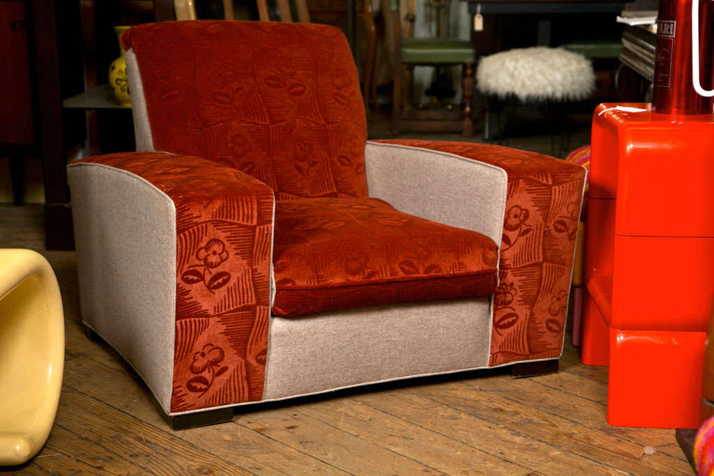 Made by FRANKL STUDIOS- recently reupholstered in grey wool
outside and Rust color embossed mohair print on the interior....
Mahogamy feet - Arms are 19