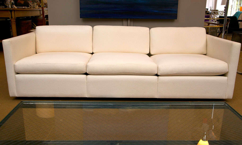 Created by Charles Pfister for Knoll in 1971. These vintage sofas offer a clean design with long term flexibility and versatile aesthetics. Beautifully made with hardware frames, original white upholstery and steel legs. Reupholstery is suggested.