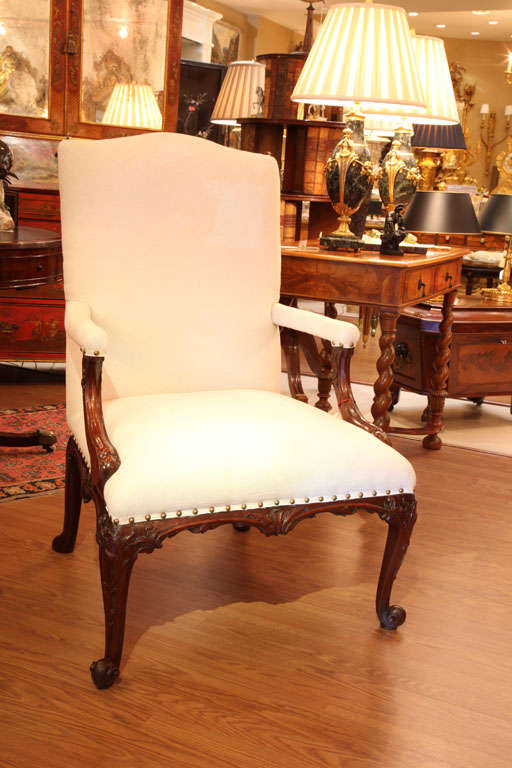 19th carved mahogany Chippendale open arm chair