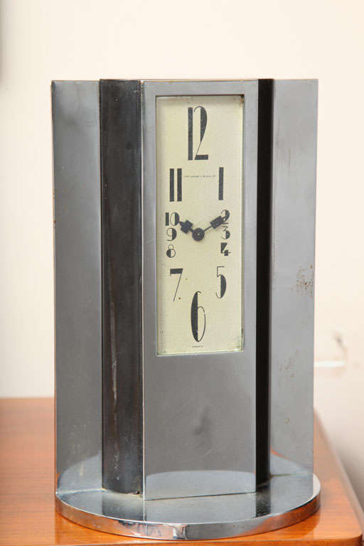 Chrome-plated and bakelite clock from circa 1930s, with Classic Art Deco numerals

Clock face signed 
