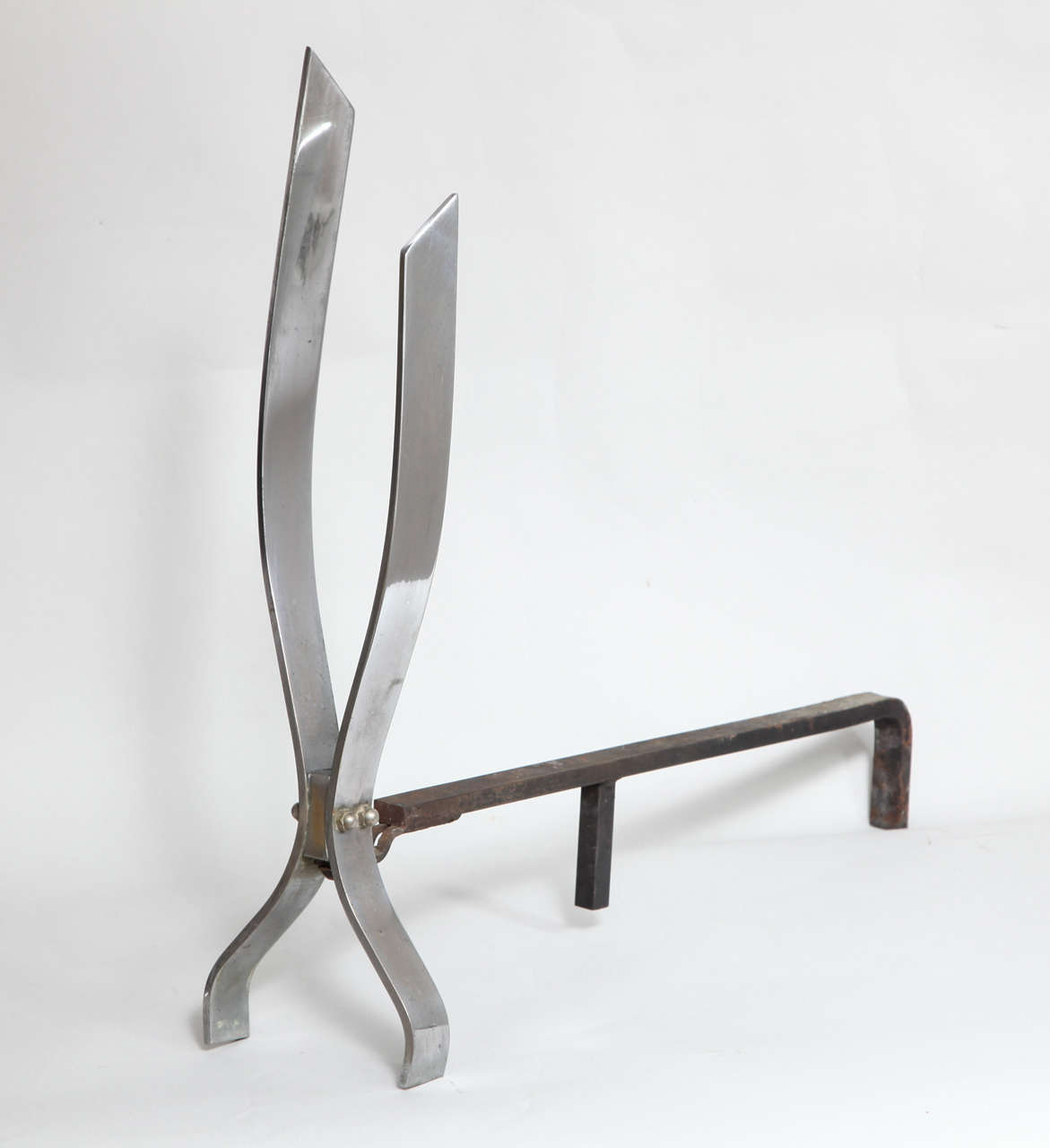 A great pair of Mid-Century Modern andirons attributed to Donald Deskey.