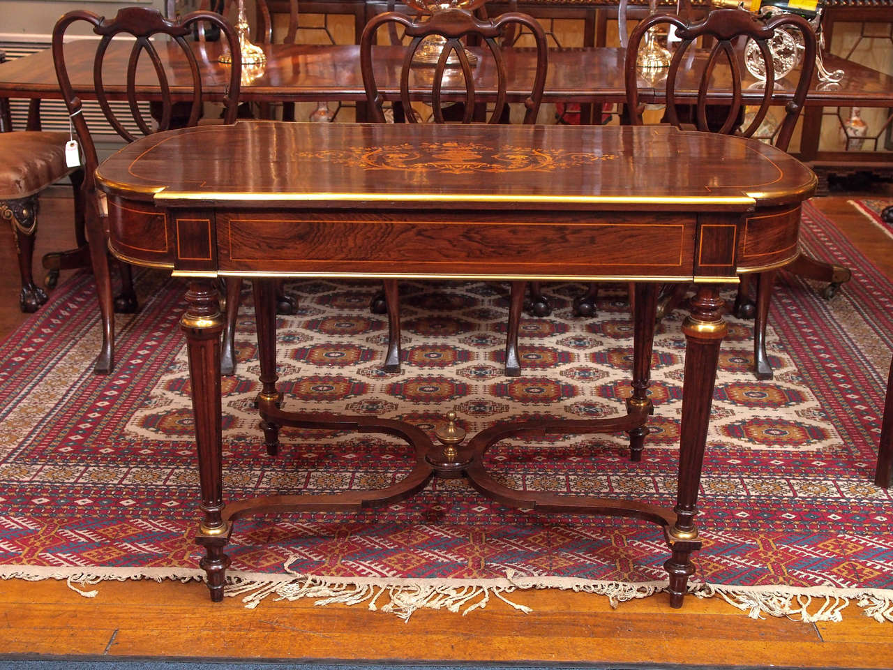 The inlay in this lovely center table is spectacular and of the finest quality.