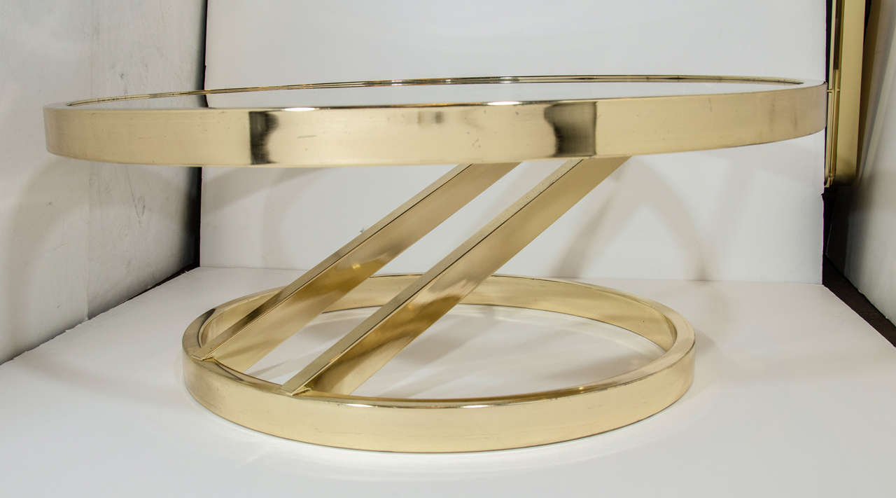 Polished Circular Brass Coffee Table with Cantilevered Base by Milo Baughman