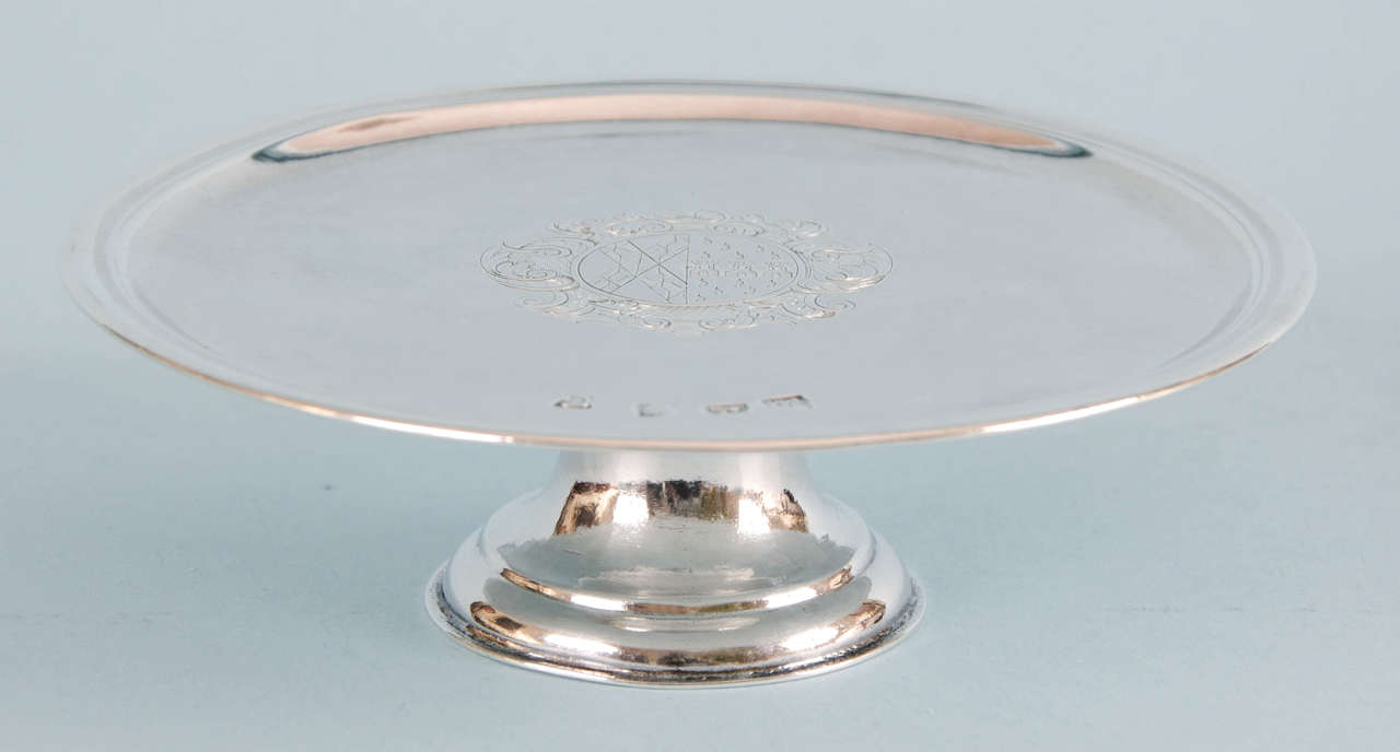 Very attractive sterling silver George I Tazza. 
Made in London by Thomas Morse in 1722. 

The Tazza is plain with a lightly reeded outer rim and stands on a raised foot. 

The full set of hallmarks are clearly marked on the top of the Tazza