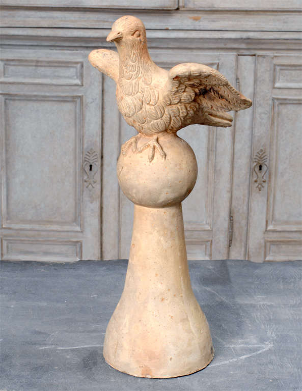 "Epi de Faitage" roof final in the shape of a pigeon