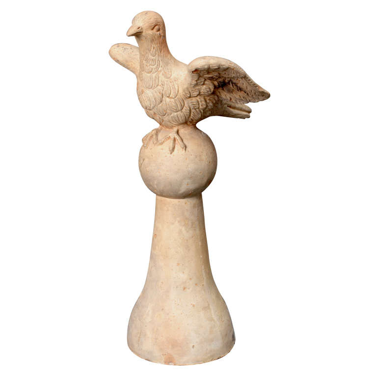 "Epi de Faitage" roof final in the shape of a pigeon