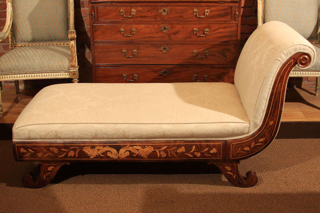 Dutch Marquetry Chaise Longue

This wonderful Mahogany chaise has light satinwood or boxwood inlay along both long sides of the chaise as well as the foot end.  The marquetry is also pillowed which creates a rounded three-dimensional look.

The