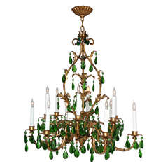 A 12 light Gilt Iron Italian Chandelier