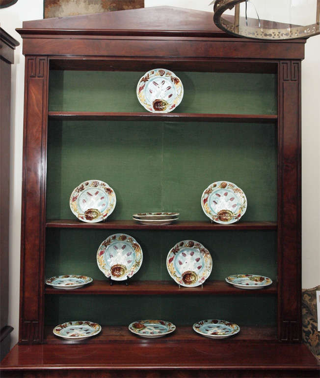 Rare pair of  Charles X (1757-1836) bibleotheque (bookcases) of flame mahogany. Unusual form as they are cabinets beneath consoles with open shelves.