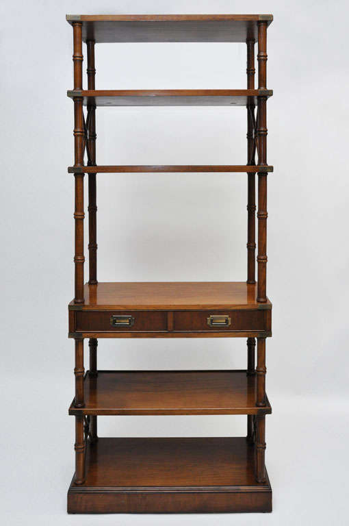 CAMPAIGN STYLE ETAGERE FROM THE 1960S.   5 SHELVES AND ONE DRAWER WITH BRASS HANDLES.  BRASS 