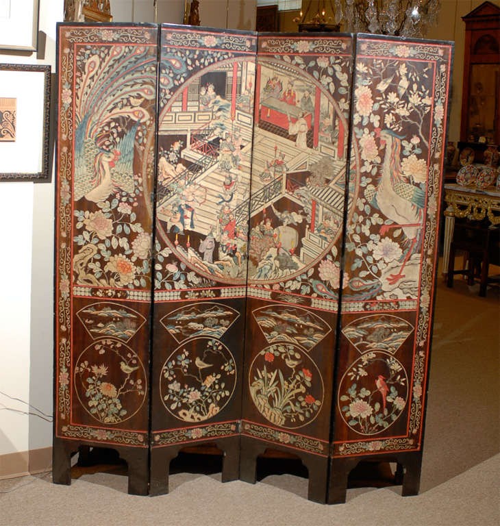 A coromandel 4-panel screen with chinoiserie design of figures, foliage and peacocks with vivid colors and brown back ground.  <br />
<br />
For many more fine antiques, please visit our online gallery at: www.williamwordantiques.com<br />
<br