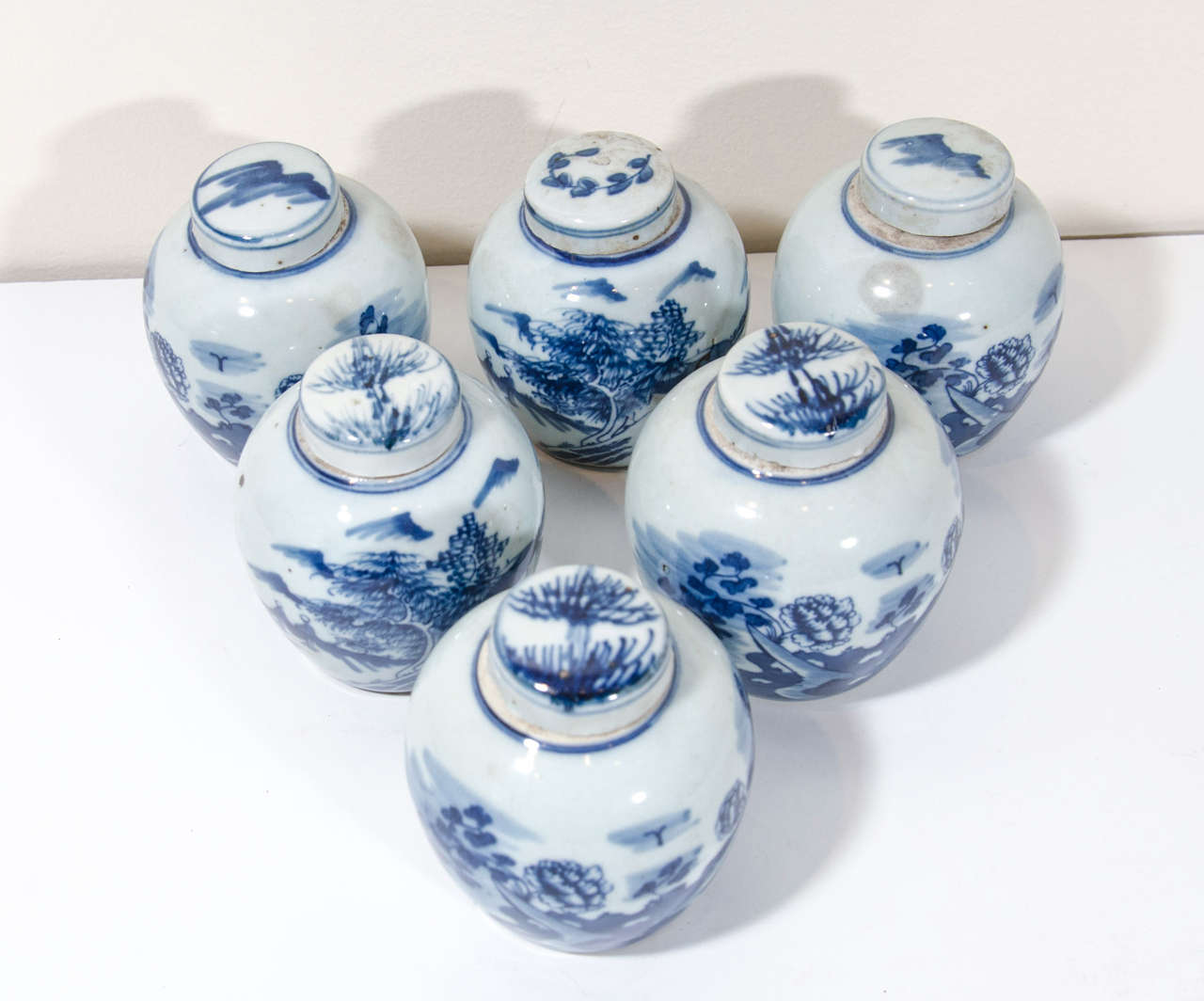 small porcelain containers with lids
