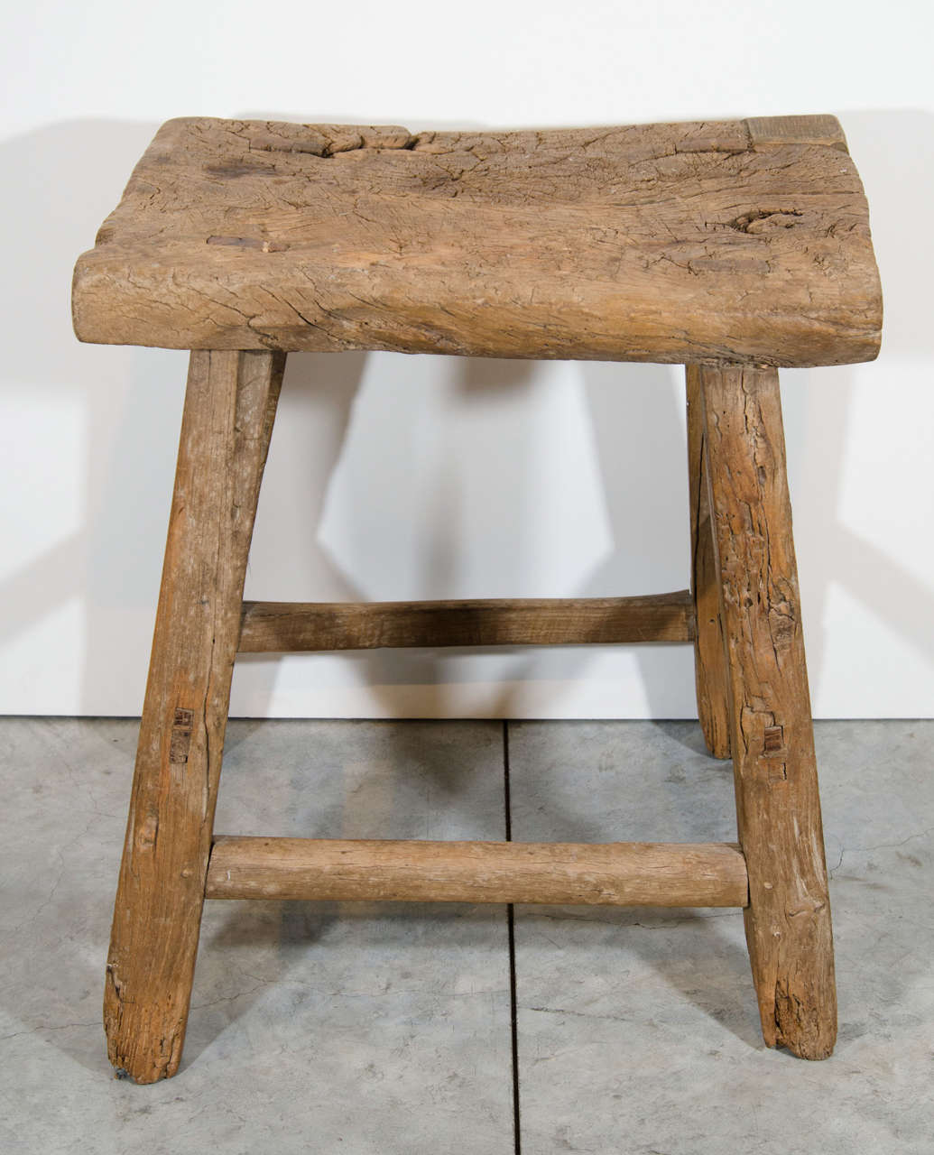 A rustic, country stool from rural China. From Shanxi Province, c. 1900.
S497