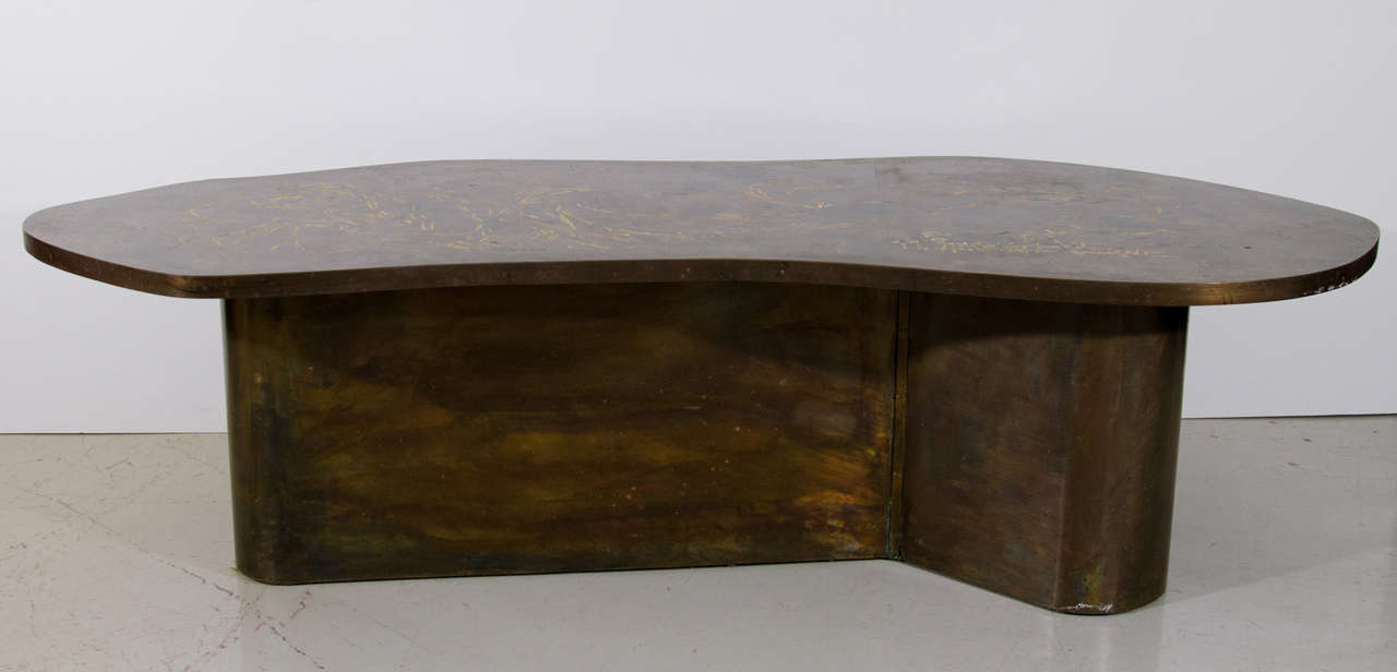 This beautiful table is a gorgeous example of Philip and Kelvin Laverne's artistry. The surface of the table is signed and features a female nude. See photo for signature.