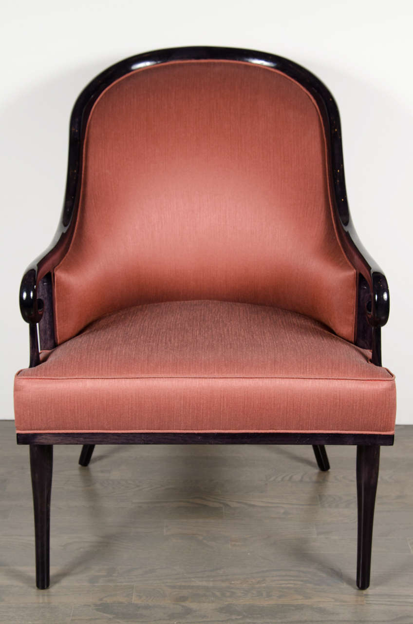 Gorgeous pair of Mid-Century occasional chairs with accentuated scroll arms and stylized spindle detailing with a spoon back design, newly upholstered in a metallic rose gold sharkskin. These chairs have been mint restored.

American, Circa 1960
