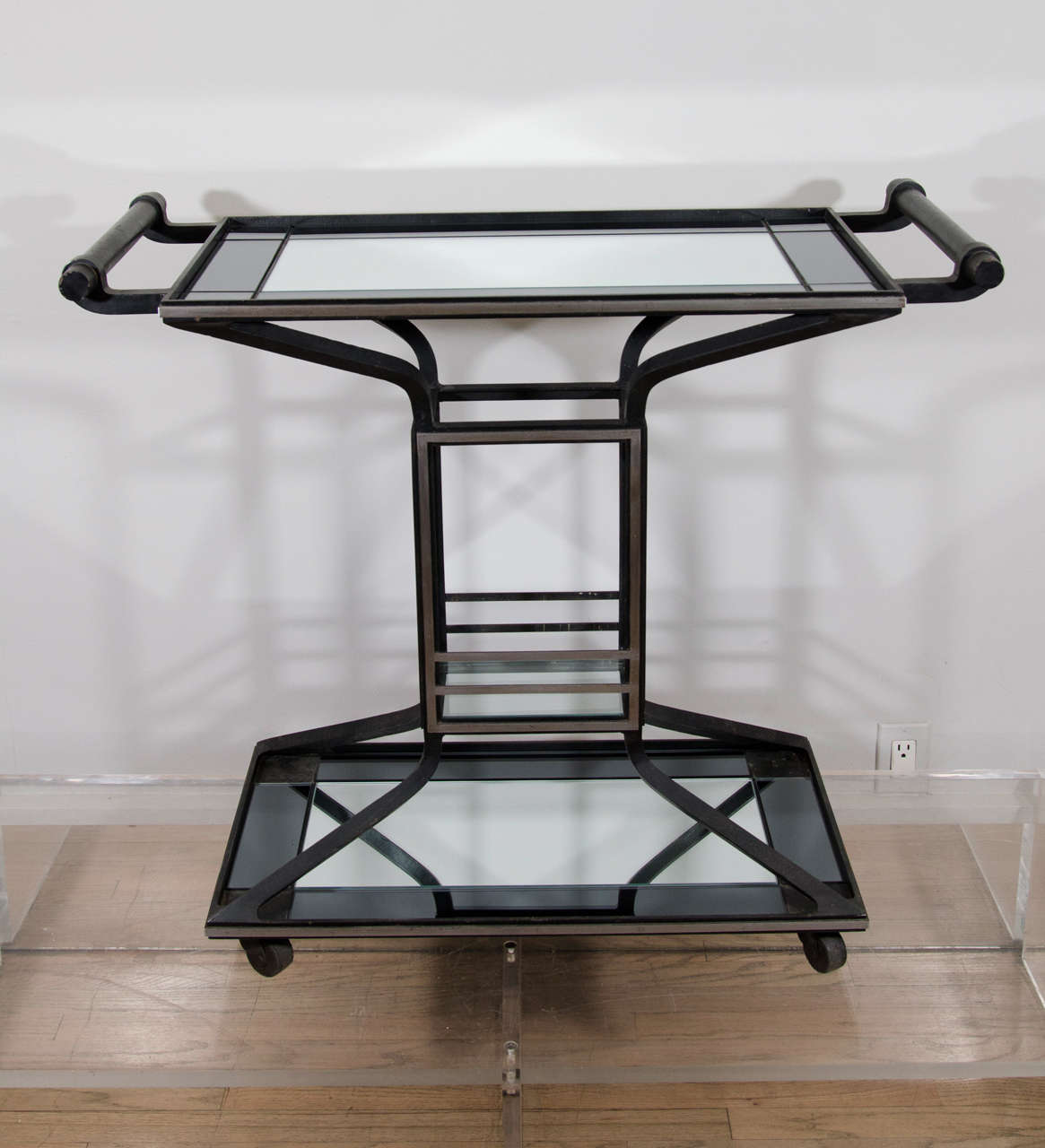 Three tiered  iron bar, beautifully detailed in industrial art deco style. Fitted with new two tone mirror, the frame in its original finish.