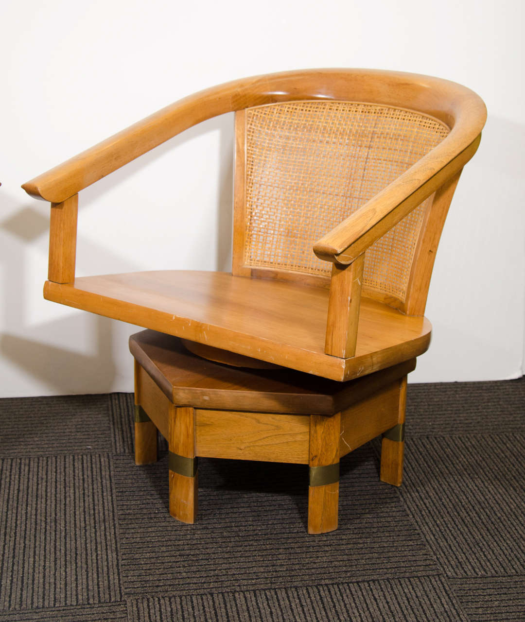 Great Pair of Edward Wormley for Dunbar swivel chairs with beech frames, cane backs and polished brass trim.