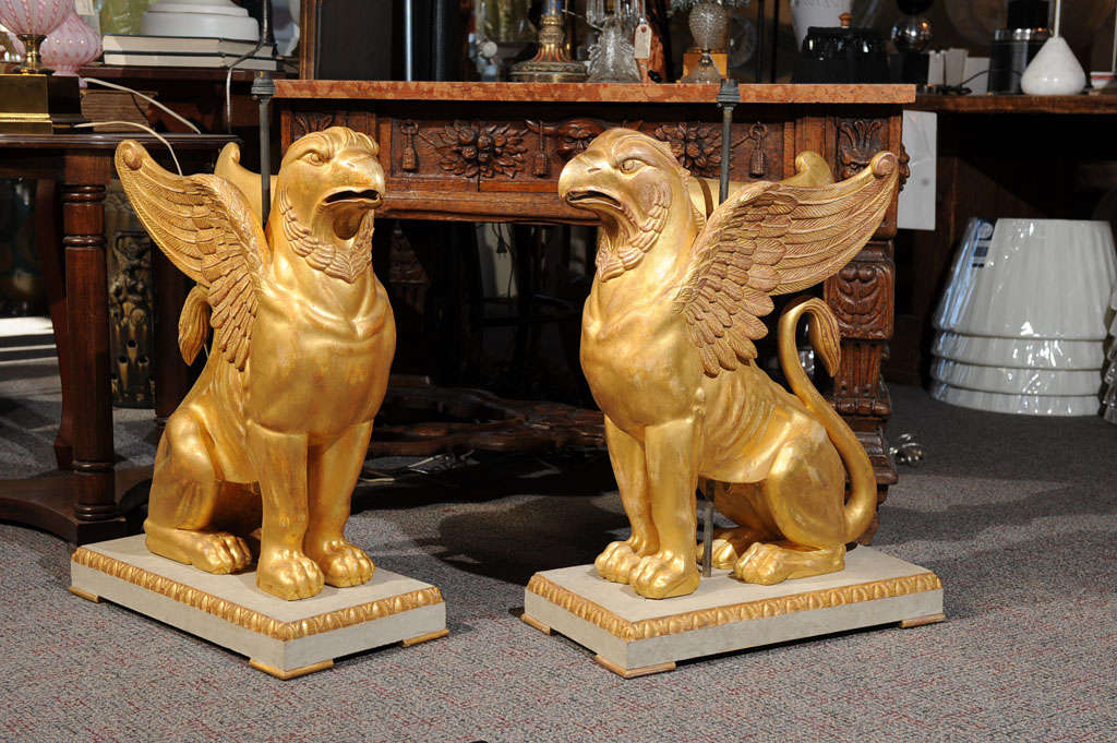 Wonderfully detailed hand carved, completely hand gilded and painted.  Born in Sweden in the mid to late 19th century.  Powerful in scale and intriquing in their detail.  We are happy to electrify for an additional fee.