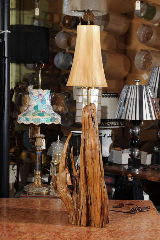 Big Sur meets Palm Springs.  Vintage free form weathered wood relic mounted as table lamp