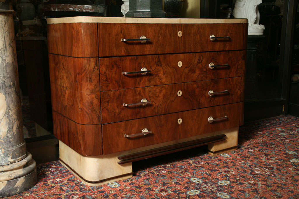 Deco style parchment and chrome glass-top commode chest of drawers.
Stock Number: MD21
