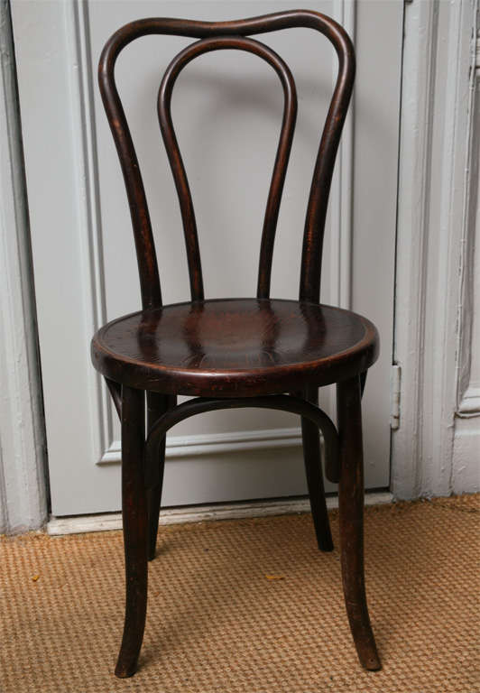 Rare set of 20 bentwood side chairs by Fischel, Czechoslovakia, circa 1900, having graceful lines and retaining original pressed wood seats and all with great color. Labeled on the underside of the seat rails.
