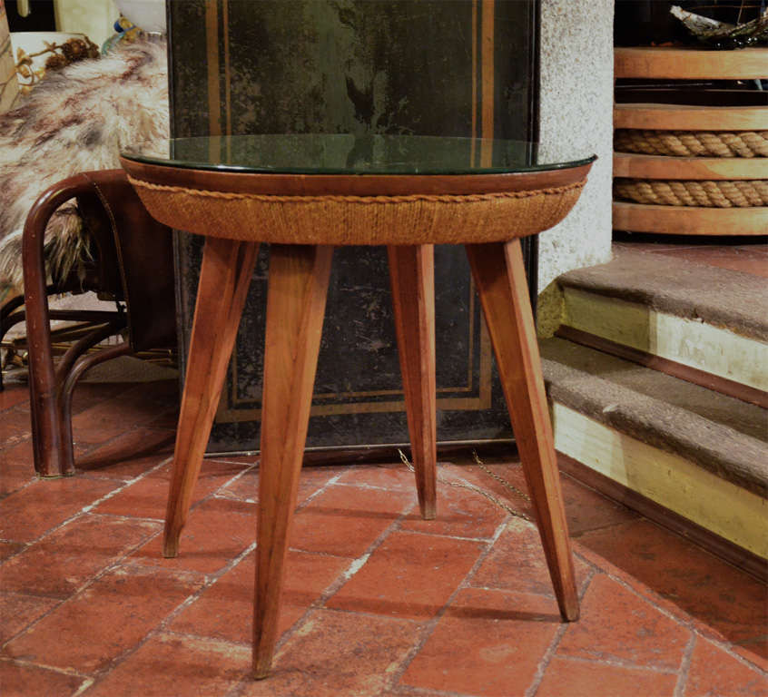 Very nice Sixties coffee table with twine upholstery and removable mirror glass top.