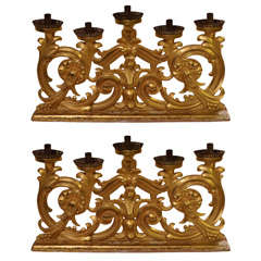 Pair of gilded 18th century torch holders
